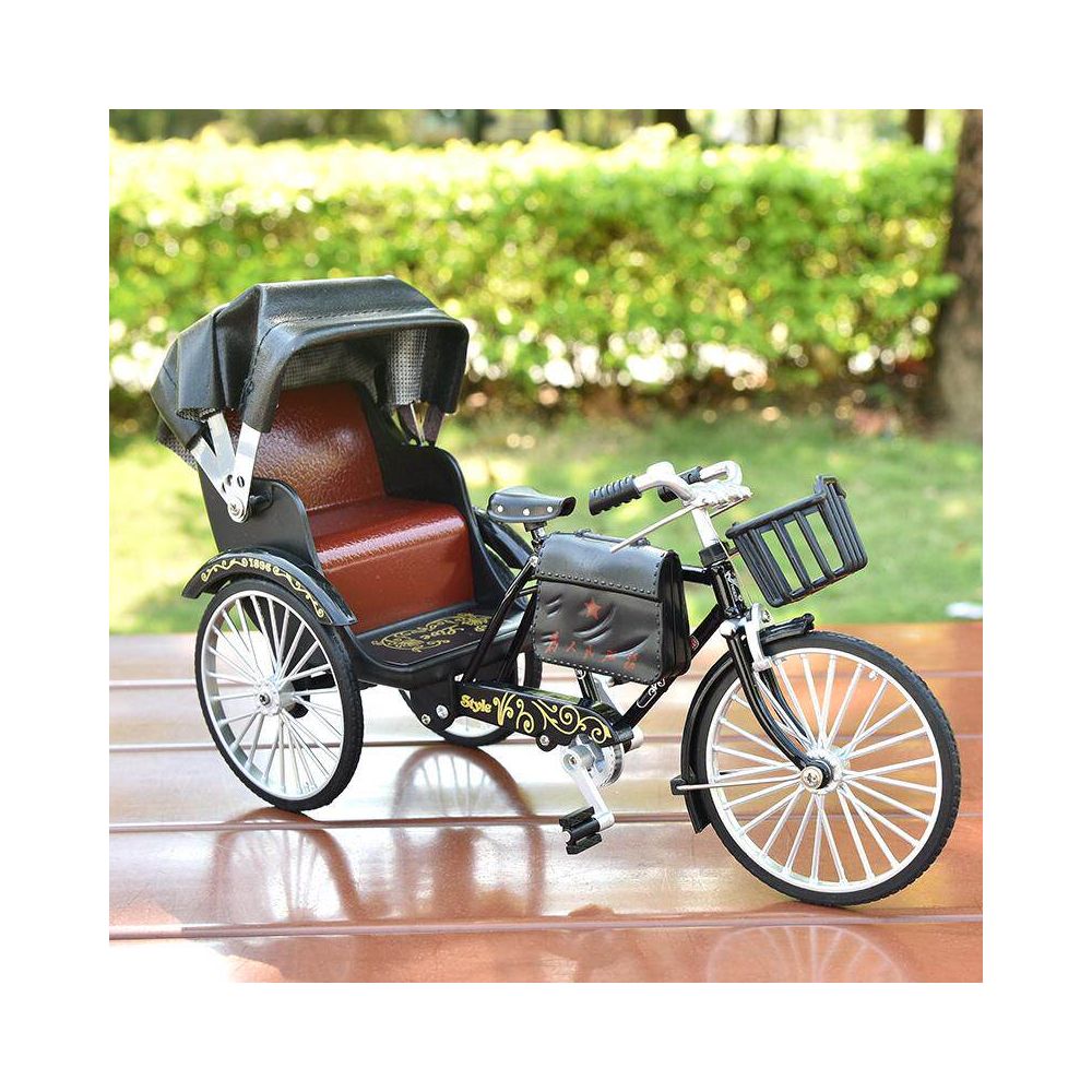 A retro style rickshaw model ornament with a vintage alloy finish made of 28 inch alloy image 0